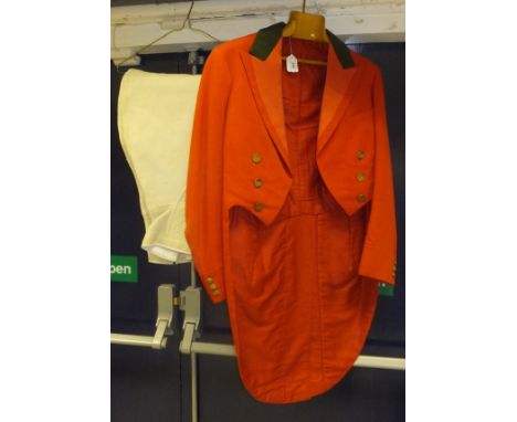 A red evening tailcoat with brass buttons initialled "OSBH" (Old Surrey & Burstow Hunt) and
a pair of hunting breeches by Ber