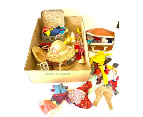 Large selection of vintage and later dolls clothes 