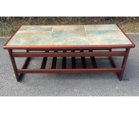 Retro tile top teak coffee table with magazine rack, Approximate measurements: Height 16 inches, 42 inches Length, Width 22 i