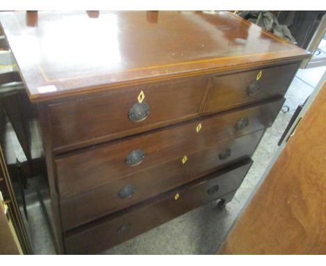 A Georgian mahogany string inlaid chest of two short and three long drawers on bracket shaped feet, 44 1/2" h x 43 1/2"w 