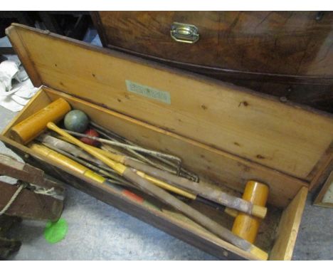 A vintage boxed croquet set 