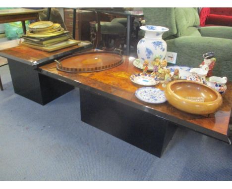 A contemporary ebonized and mixed wood veneered coffee table, 16 1/2" x 48 6/8" x 27 2/8" and a similar lamp table, 18 1/2" x