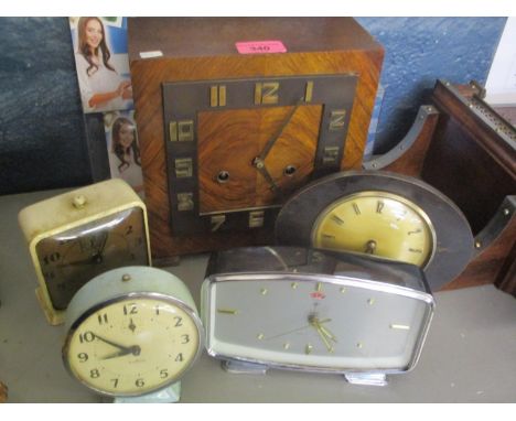 Mixed vintage clocks to include a walnut mantle clock fitted with a German 8 day movement 