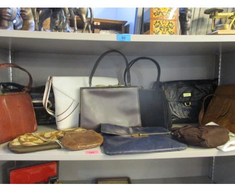 Vintage handbags to include a Suzy Smith black shoulder bag, a Beaugency black snakeskin style shoulder bag and a mid brown s