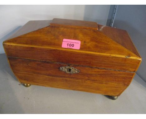 An early 19th century walnut tea caddy having lion mask ring handles, 7 1/2"h x 12" w 