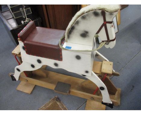 A vintage wooden rocking horse 