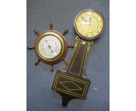 An early 20th century Gilbert wall clock, together with a wheel barometer 