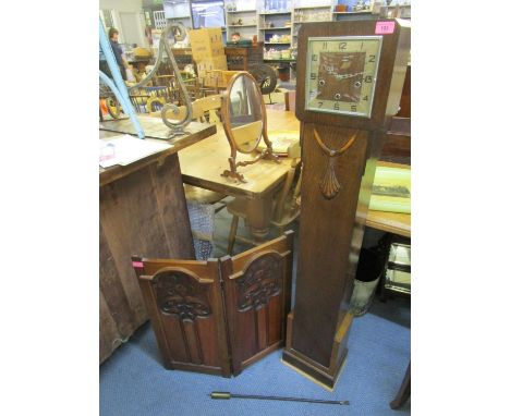 An early 20th century oak cased granddaughter longcase clock and a mahogany carved Art Nouveau fire screen 