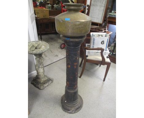 A Victorian leather bound torchere stand together with a brass pot 
