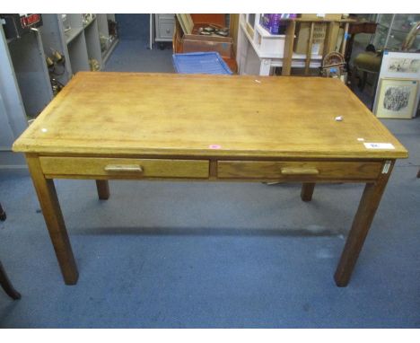 A mid 20th century light oak desk having two inset drawers and block shaped legs, 29 1/2" h x 53 1/4"w 