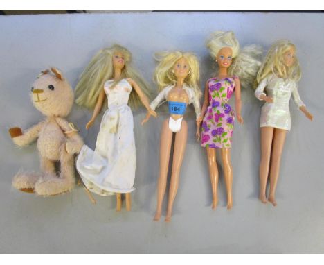 A group of four dolls to include a modern Sindy Model B94 and a Model B102, a 1966 Mattel Inc, Malaysia, Sindy doll and a 196