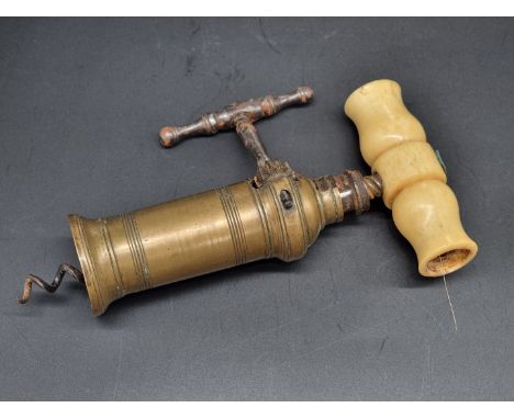 A Victorian Thomason patent brass and bone barrel corkscrew,&nbsp;with steel handled rack and pinion mechanism.
