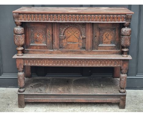 An antique oak and inlaid buffet, 108cm high x 125cm wide, (probable alterations).