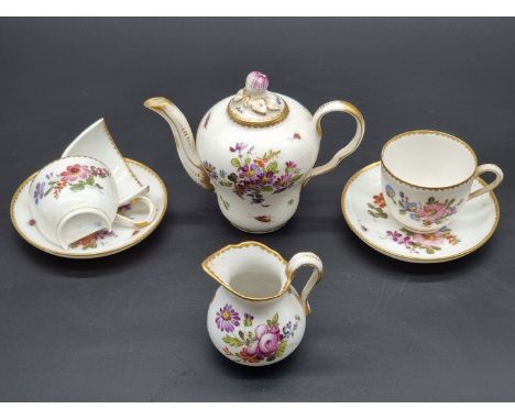 A 19th century Dresden porcelain part tea for two set, the teapot and cover 10.5cm high, (one cup a.f.).