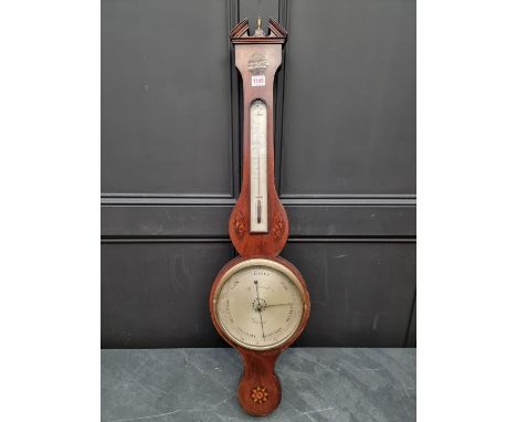 A 19th century mahogany and inlaid two dial banjo barometer, inscribed 'W Squirrell, Bildeston'.