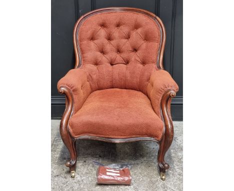 A Victorian carved mahogany and button upholstered occasional armchair. 