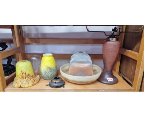 An Art Deco marbled glass table lamp, (lacking shade), 31cm high; together with four further glass shades; and an onyx circul