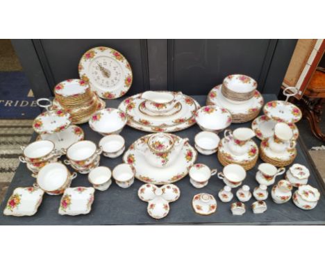 An extensive Royal Albert 'Country Rose' pattern tea and dinner service.&nbsp;(92)  