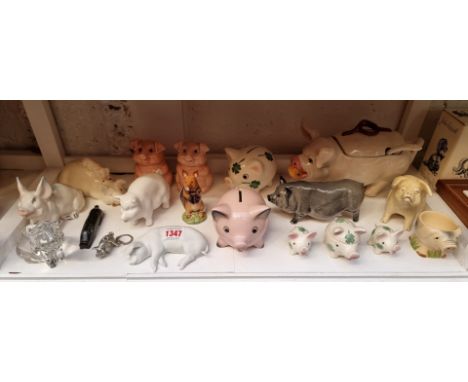A collection of ceramic pigs, to include examples by Royal Doulton, Beswick and Goebel. (19)