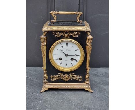 A late 19th century ebonised and brass mantle clock,&nbsp;the enamel dial inscribed 'Christie, Cannon Street, London', 26cm h