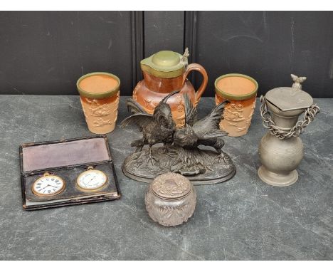 A mixed lot, to include a spelter figure of two cockerels; and a leather cased combined clock and barometer set. (7)