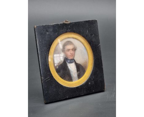British School, 19th century, bust length portrait miniature of a young gentleman, on ivory, 8.3 x 5cm oval. DEFRA Ivory Act 