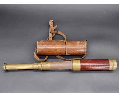 A brass and mahogany four drawer telescope, inscribed 'Elliott, 266 Holborn, London', 70cm extended, in leather case.