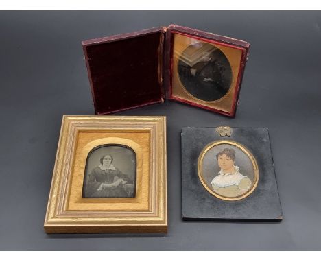 A Victorian ambrotype; together with another Victorian photograph; and an early 19th century portrait miniature. (3) 