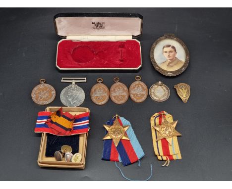 Medals: a small group of World War I period copper medals, to Sgt W H Barton; together with another HMS Whitehall medal, to A