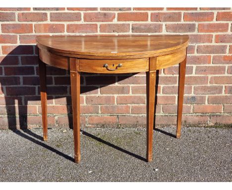 A George III mahogany and line inlaid demi-lune card table, possibly Scottish, with double gateleg action, 101cm wide.
