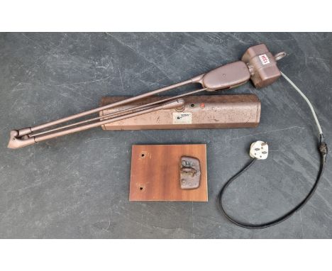 A vintage Sentry articulated lamp, with wall mount.