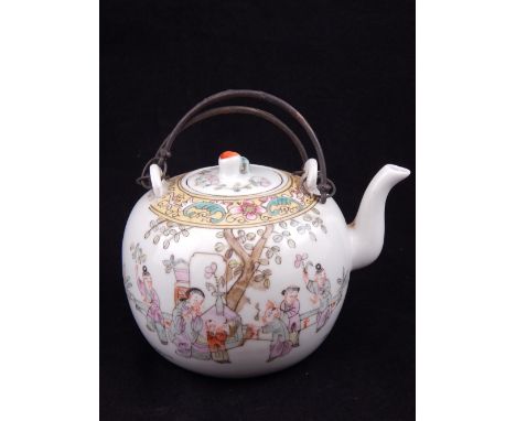 A Chinese famille rose teapot, decorated with figures in a procession and children with attendants under a tree, the lid with