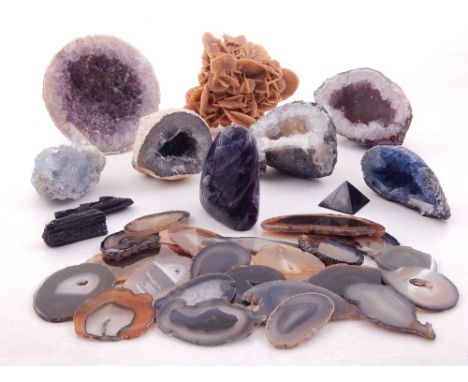 A collection of specimen rocks and minerals to include amethyst geodes, quartz, agate sections etc.(qty)