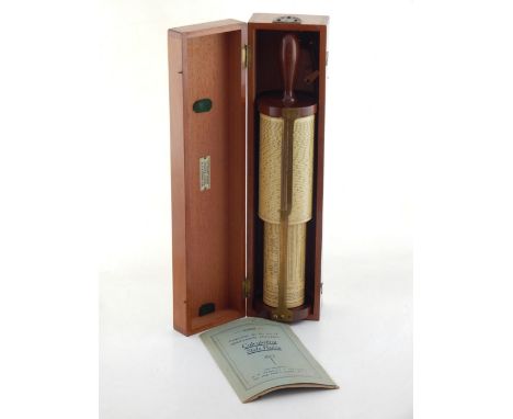 A W. F. Stanley Fuller calculator, within mahogany box incorporating stand, with instruction manual, L. 46cm