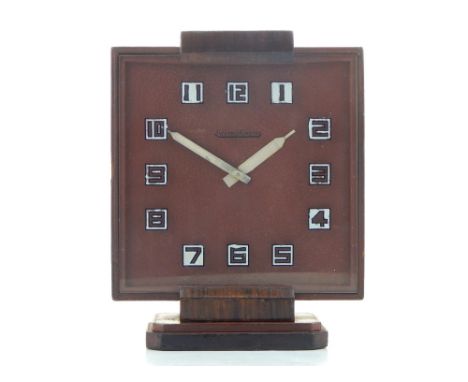 A 1930s Art Deco rosewood Jaeger LeCoultre mantel clock, the rectangular glass dial with Arabic numerals. H. 20cm