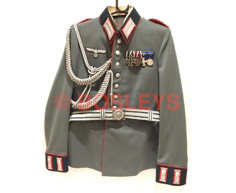 German Third Reich Artillery Major's Parade Tunic with Medals, Aiguillette and Belt. A fine quality field grey Waffenrock wit