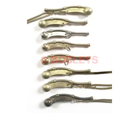 8 x Royal Navy bosun's calls. Nickel plated brass examples. Each bearing WD Broad Arrow; four with chains Service wear. Gener