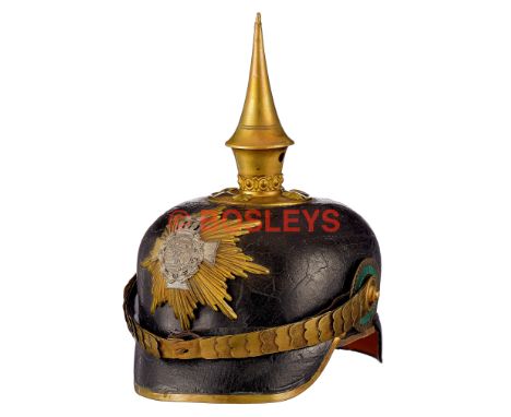 WW1 Imperial German Saxon Reserve Officer's Pickelhaube, A good scarce example. Black leather skull with front and rear peaks