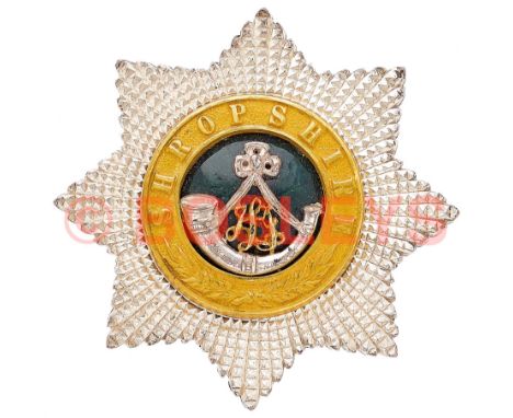King's Shropshire LI post 1882 Officer's forage cap star. A fine example comprising a cut silvered eight pointed star mounted