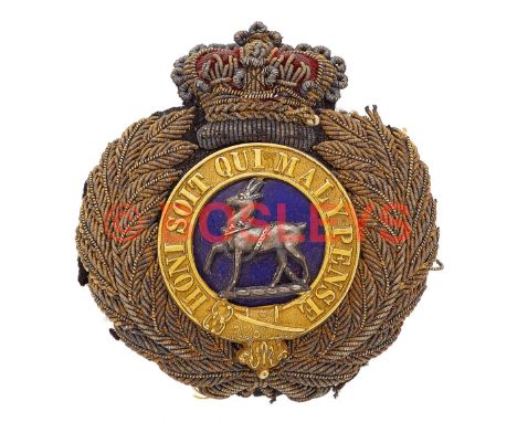Royal Warwickshire Regiment post 1881 Victorian Officer's forage cap badge. A good padded example. Mounted on crowned bullion
