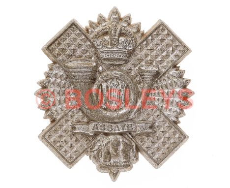 Scottish. Highland Light Infantry WW2 plastic economy glengarry badge. A good scarce example. Thistle Star bearing crown, cur