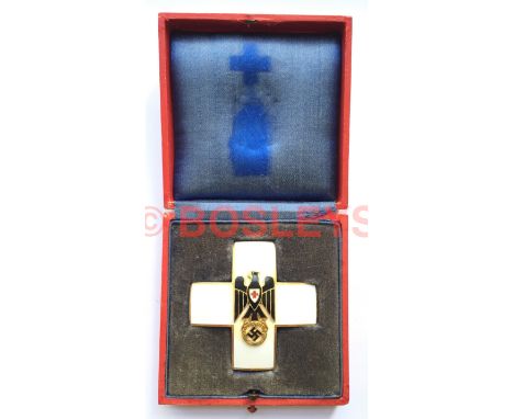 German Third Reich Cased Red Cross Decoration A good scarce pinback breast badge example in gilt and enamels circa 1934-37. W