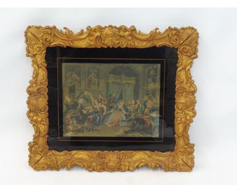 A gilt framed interior scene print set within a glass mount, 16 x 14".