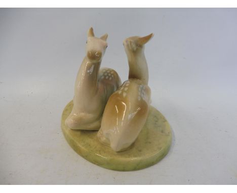 A Goldscheider with Myott Son &amp; Co. group of two seated fauns, 4" h.