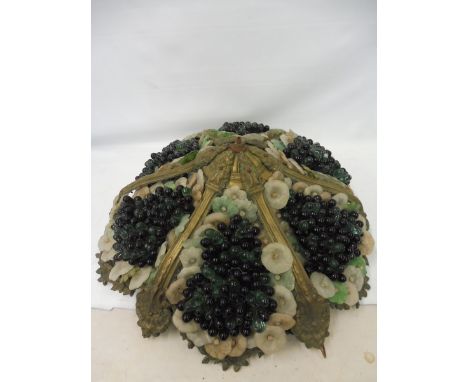 A very unusual and large light fitting formed as glass flowers and drops, probably Edwardian, 23 1/2" diameter. 