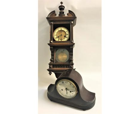 WALNUT CASED WALL CLOCKWith an eight day movement, together with a mahogany cased mantle clock with a silvered dial and eight