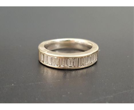 DIAMOND HALF ETERNITY RINGthe channel set baguette cut diamonds totaling approximately 0.75cts, on eighteen carat gold shank,