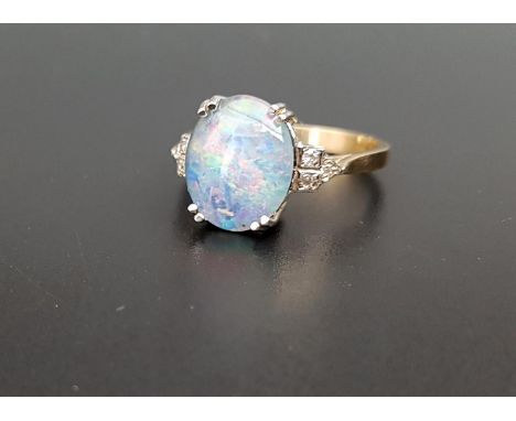 ATTRACTIVE OPAL TRIPLET AND DIAMOND DRESS RINGthe oval opal triplet approximately 1.2cm x 1cm, flanked by three diamonds to e