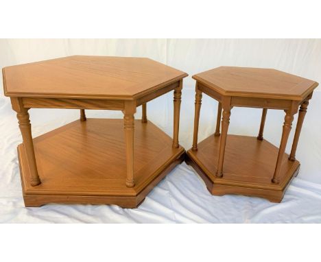 TWO LEGATE LIGHT OAK AND CROSSBANDED OCTAGONAL OCCASIONAL TABLESeach with a moulded top standing on turned supports united by