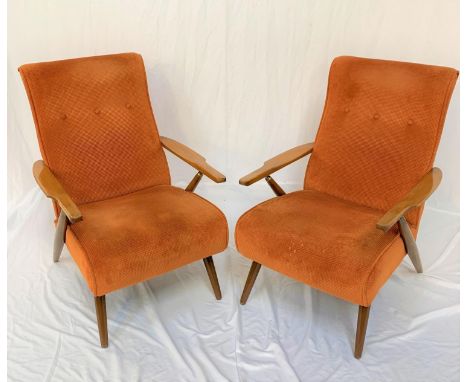 PAIR OF RETRO RECLINING ARMCHAIRSwith padded button backs and seats with shaped beech arms with ratchet reclining mechanism, 